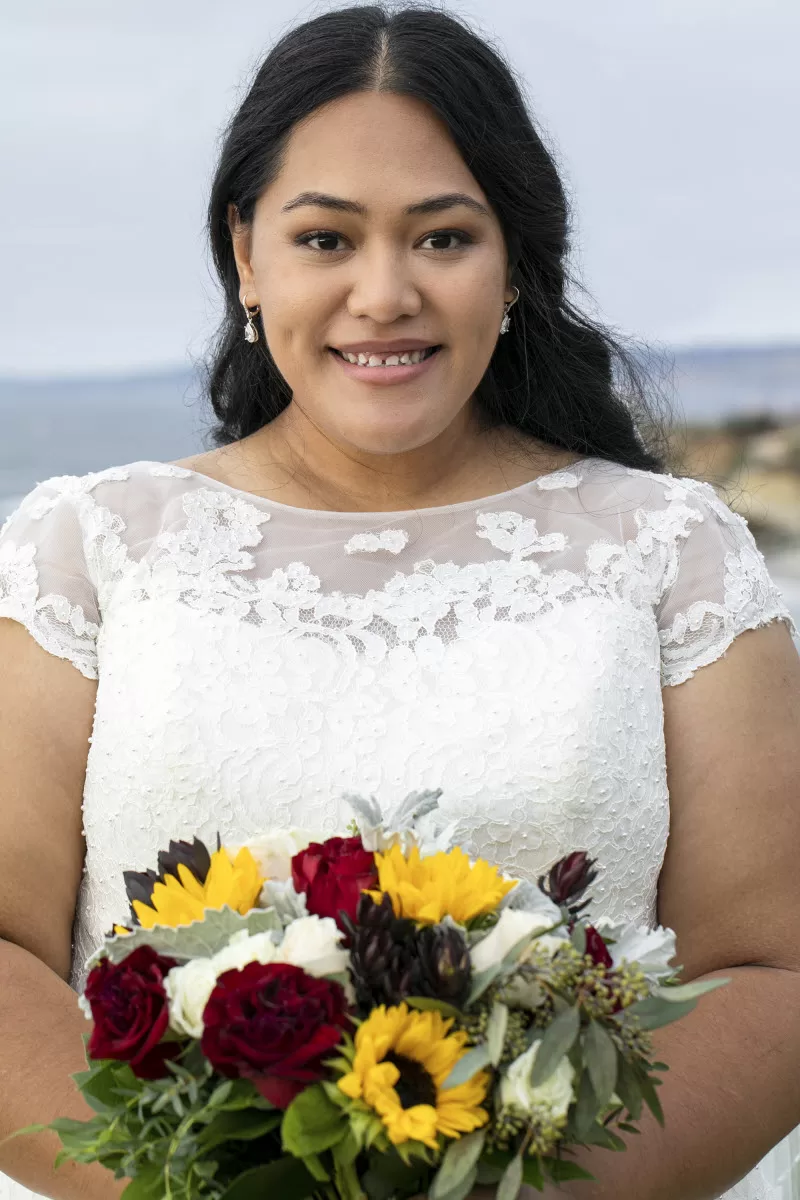 Beautiful bride solo portrait with flowers