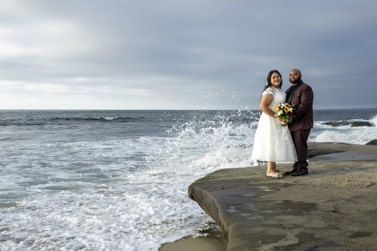 Candid style wedding photographer by the beach photographs