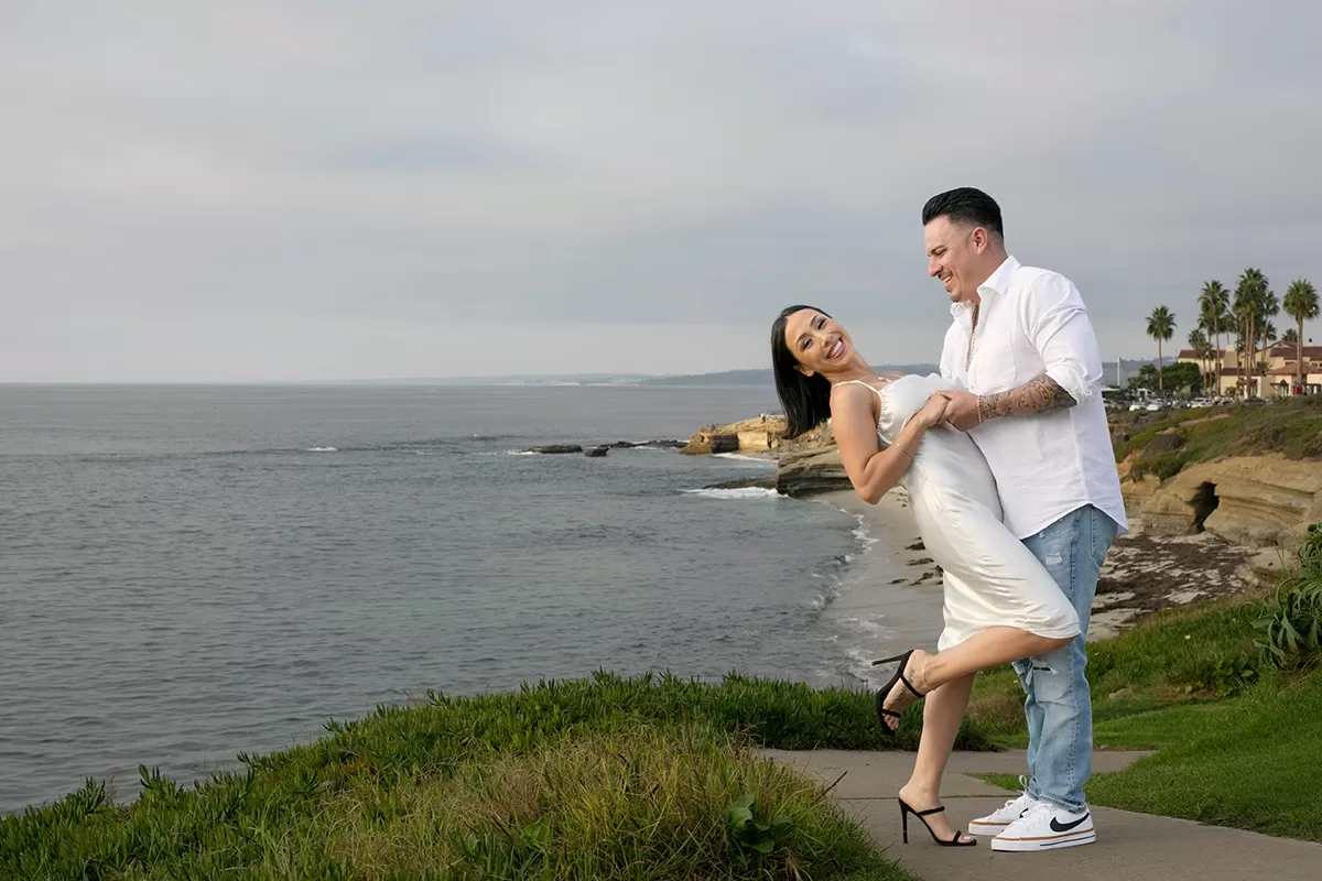 Candid wedding proposal photographer San Diego La Jolla Beach