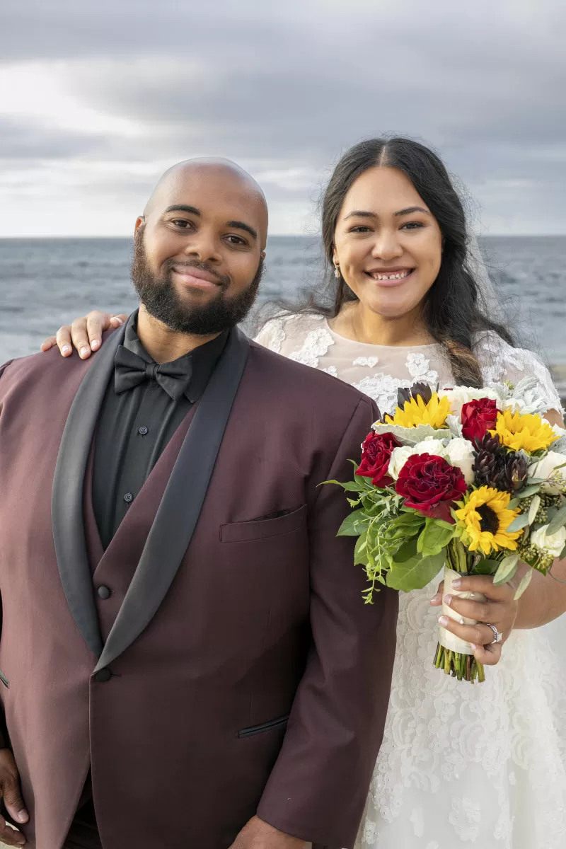 Beautiful couple best wedding photographs on a sunny day by the ocean in La Jolla