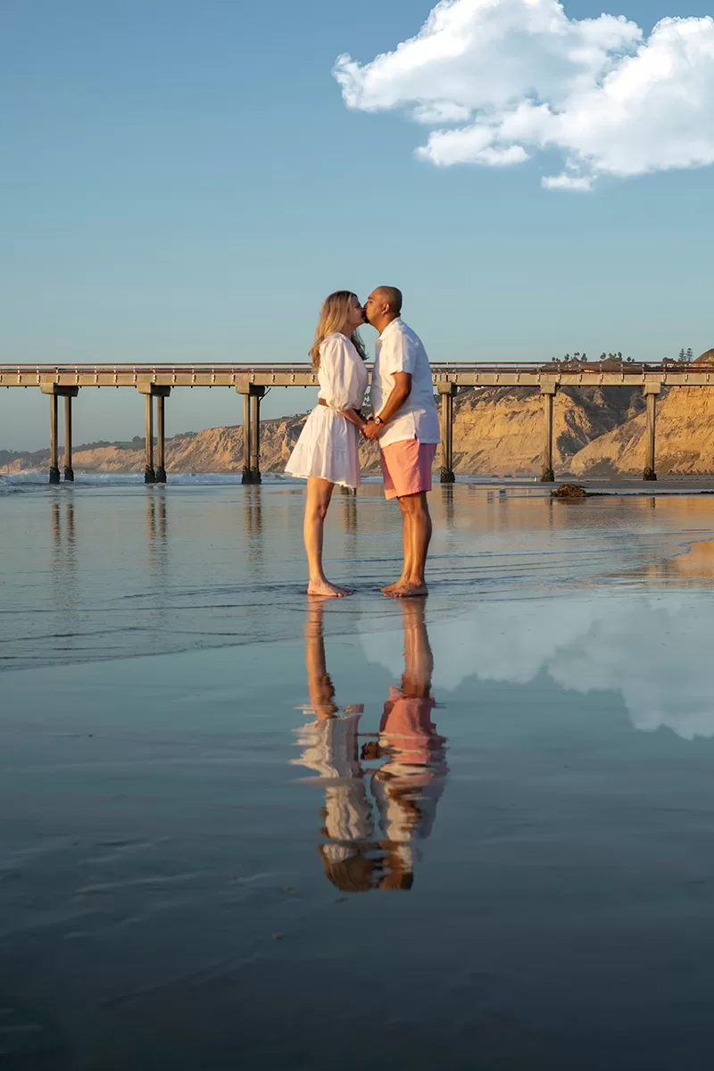 Couple photography session at La Jolla pier in San Diego